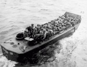 This Higgins boat is carrying troops to Okinawa.